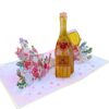 Vue en perspective de la carte de vœux pop-up 3D ouverte avec une bouteille de champagne, une flûte et des bouquets