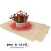 Open 3‑D champagne bottle in basket of scarlet roses, elegant pop‑up card