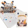 Dog birthday pop‑up card showing cover alongside lively 3‑D interior