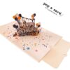 Open 3‑D dog birthday card, puppies, balloons and gifts on confetti base