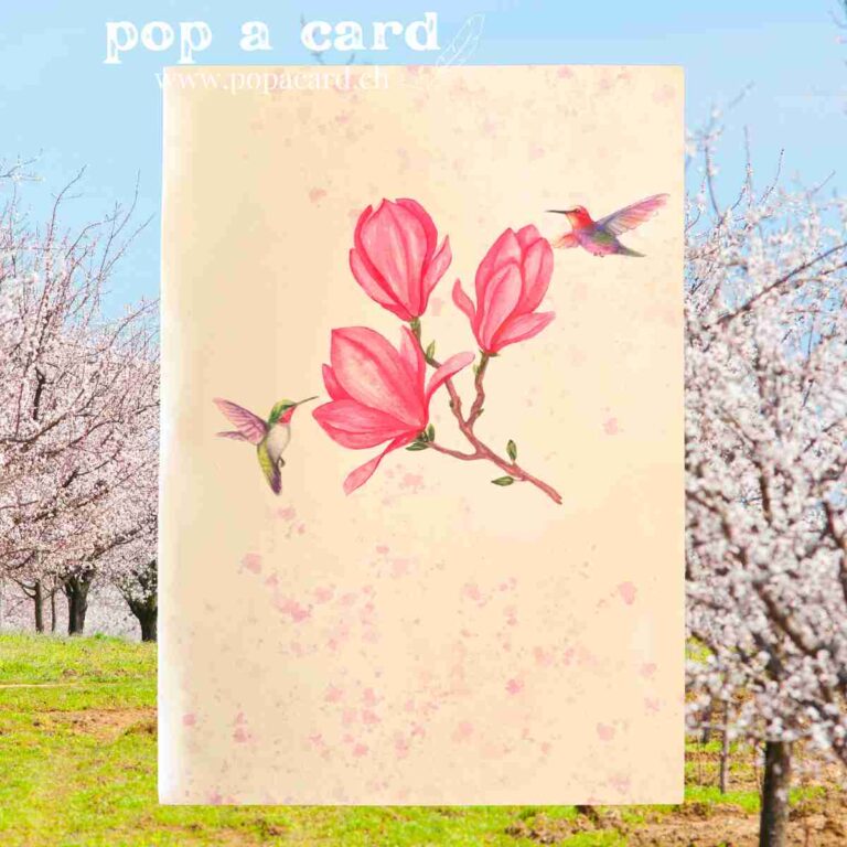Cream cover with pink magnolia branch and hummingbirds on floral pop‑up card