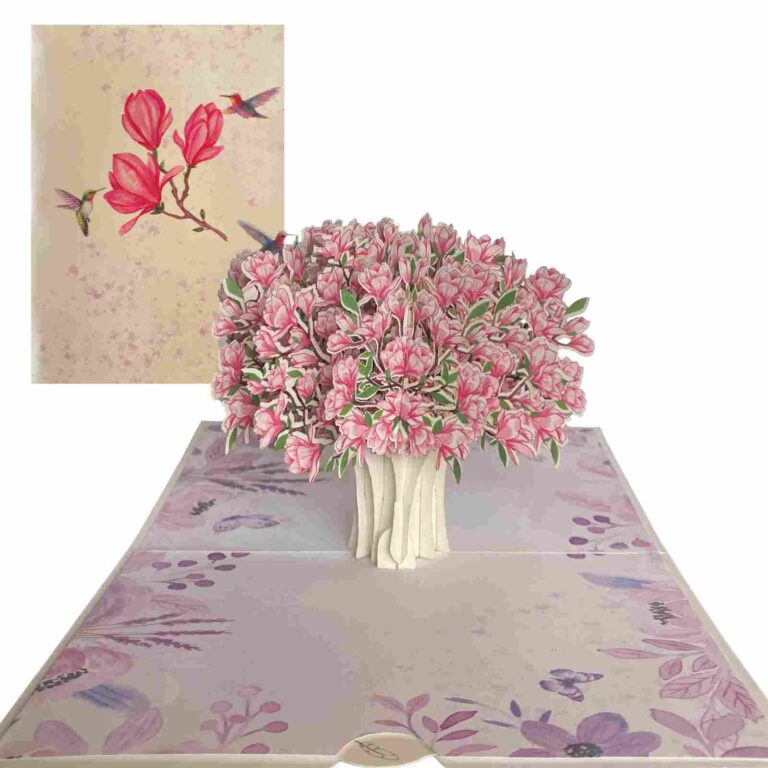 Magnolia bouquet pop‑up card displaying cover art beside lush 3‑D interior scene