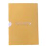Yellow back of piñata pop‑up birthday card with small brand stamp