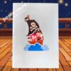 Blue cover with cartoon pirate ship artwork on kids’ pop‑up birthday greeting card