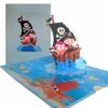 Pirate ship pop‑up birthday card displaying cover and nautical 3‑D scene