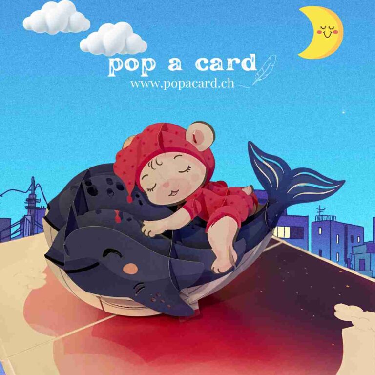 Detail of whale fins and baby pose in 3‑D new‑arrival gift card