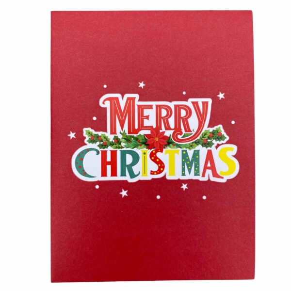 Close-up detail of the red "Merry Christmas" 3D card